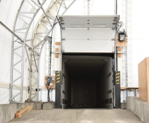 Loading dock bay inside a fabric building