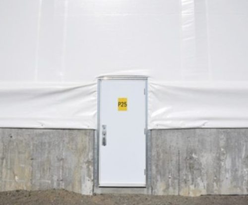 Fabric building service door for personnel walk-through access