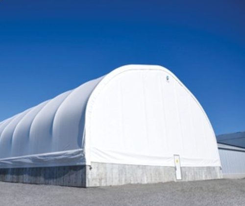 Fabric building membrane end wall closure