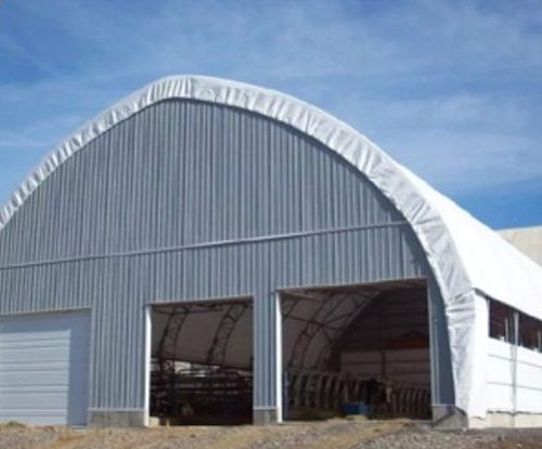 Fabric building steel panel end wall with metal sheeting
