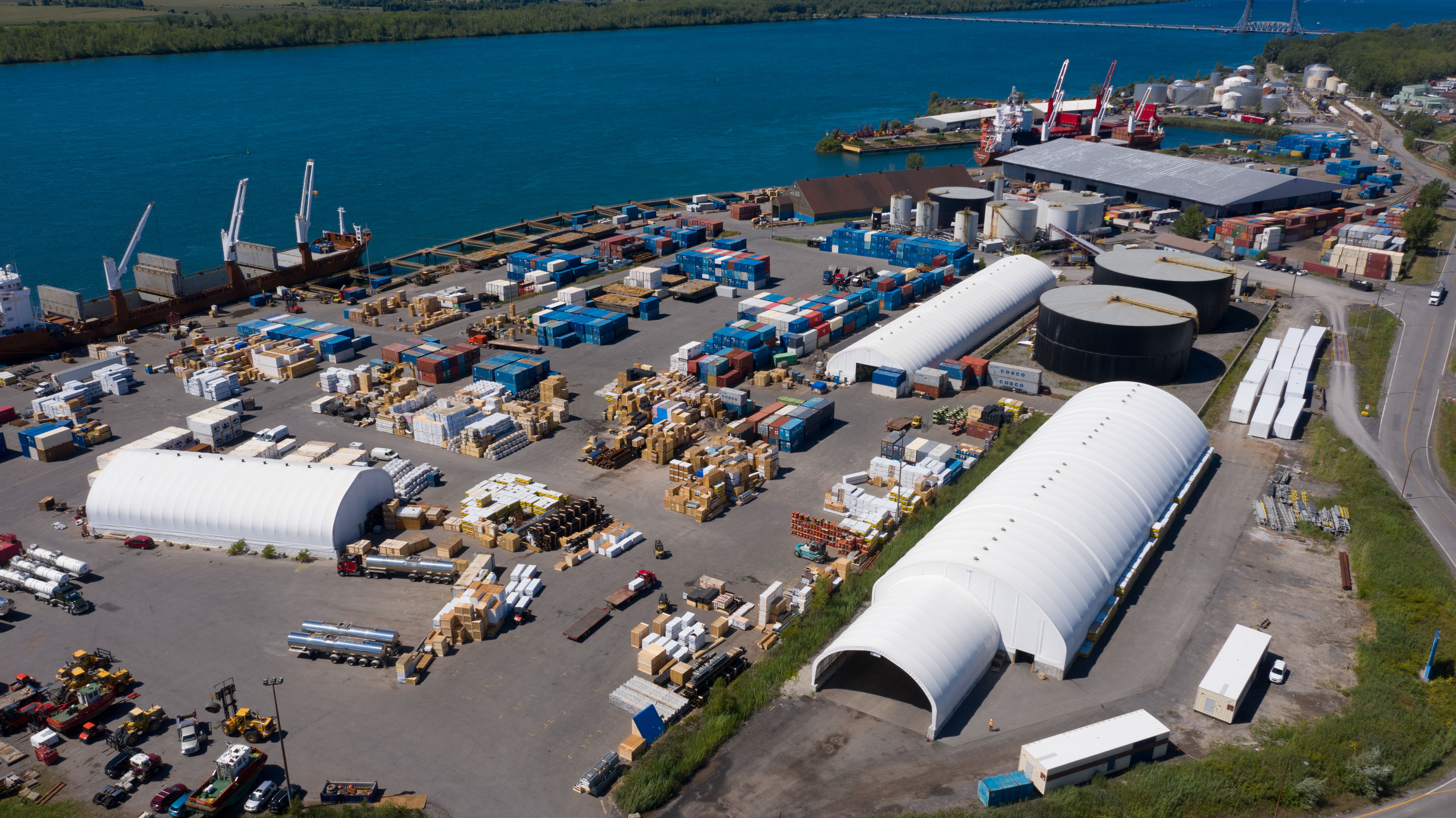 Aerial view of fabric buildings at an industrial port and harbour